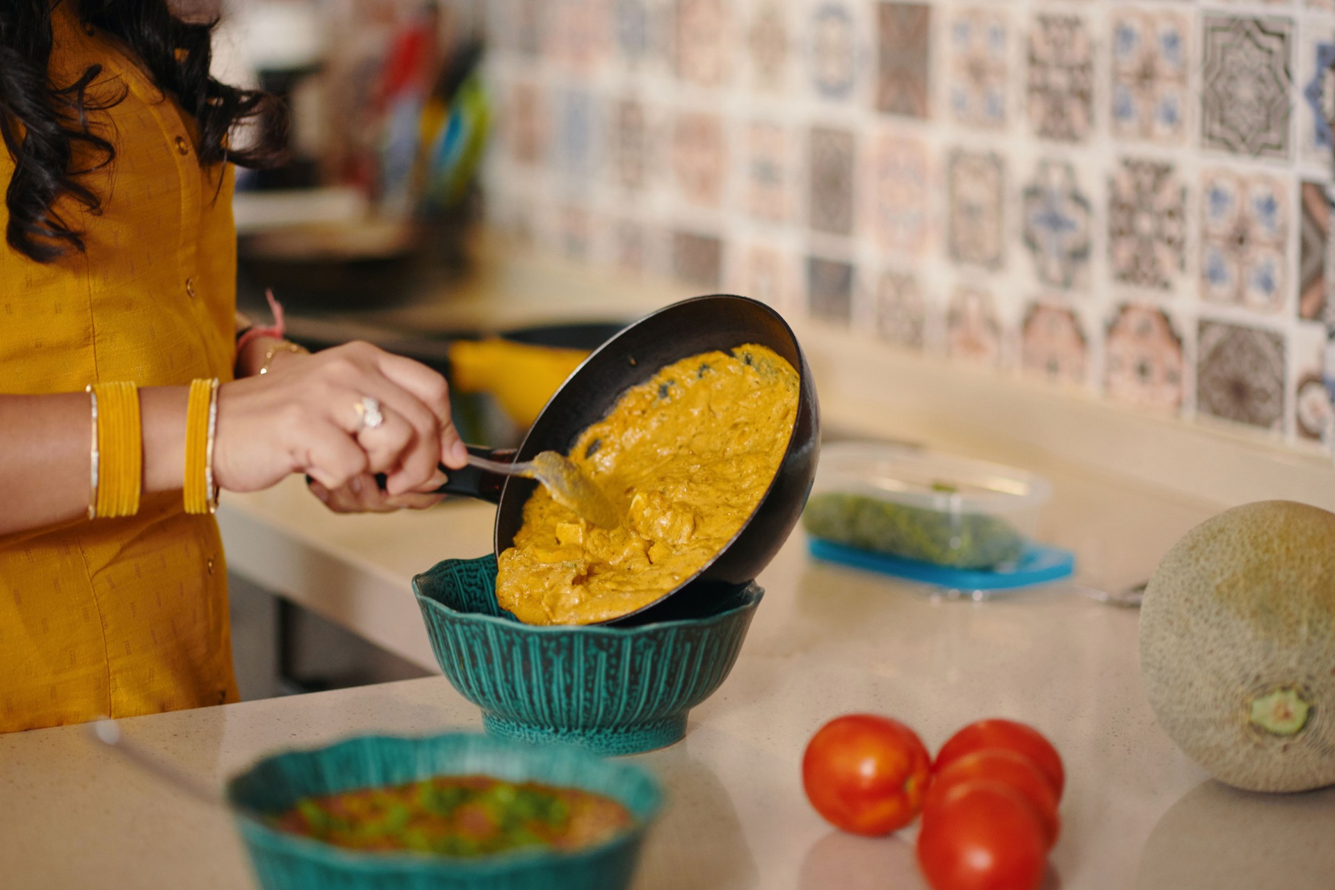 Woman Cooking Indian Food For Dinner